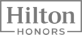 The image shows the "Hilton Honors" logo, a loyalty program for Hilton hotel guests.